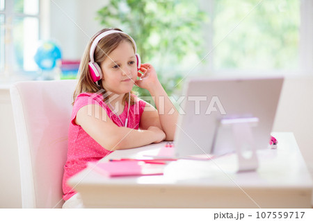 Online remote learning. School kids with computer. 107559717