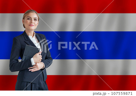 Thai businesswoman on the flag of Thailand digital nomad, business, startup concept Thai businesswoman on the flag of Thailand digital nomad, business, startup concept 107559871