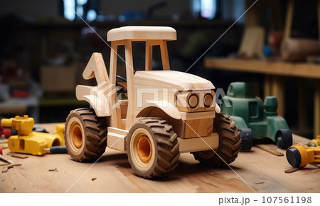 Small-scale toy makers handcrafting wooden wonders in their cozy workshop. machine. Small-scale toy makers handcrafting wooden wonders in their cozy workshop. machine. 107561198