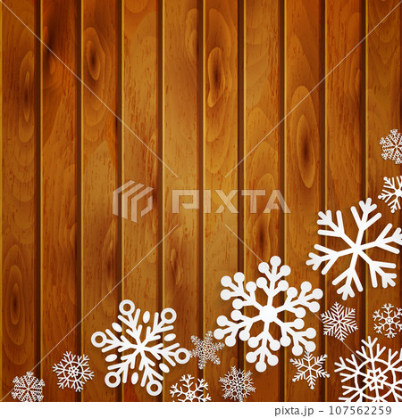 Christmas background with snowflakes on wooden planks 107562259