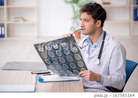 Young male doctor radiologist working in the clinic 107565164