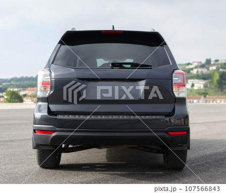 Grey SUV auto, power luxury model. Shiny polished stationary vehicle. 107566843