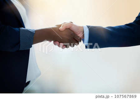Closeup hand shake, business people and agreement in office for hiring, collaboration and thank you. Woman, businessman and shaking hands with respect, deal or welcome for recruitment at interview Closeup hand shake, business people and agreement in office for hiring, collaboration and thank you. Woman, businessman and shaking hands with respect, deal or welcome for recruitment at interview 107567869
