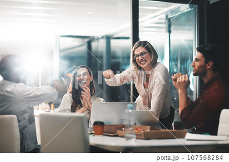 Fist bump, data analysis or business people in success business meeting, invest strategy or planning company finance.Celebrating, happy or teamwork on tax data analysis or global financial network Fist bump, data analysis or business people in success business meeting, invest strategy or planning company finance.Celebrating, happy or teamwork on tax data analysis or global financial network 107568284