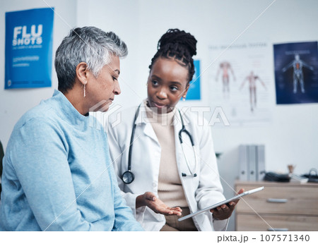 Black woman, doctor and senior patient with tablet, results and listen for health planning, advice or cancer. African medic, mobile touchscreen and healthcare with trust, tech and support in hospital Black woman, doctor and senior patient with tablet, results and listen for health planning, advice or cancer. African medic, mobile touchscreen and healthcare with trust, tech and support in hospital 107571340