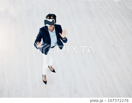 Business woman, vr headset and digital game with professional in office with metaverse and mockup. Virtual reality glasses, female employee and above view with 3d and future platform with testing 107572276