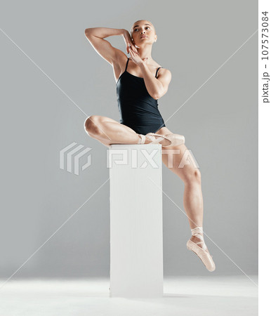 Balance, ballet or woman on block in studio in creative or elegant performance for art or freedom. Talent, dancer or girl ballerina dancing or training to exercise on platform or white background Balance, ballet or woman on block in studio in creative or elegant performance for art or freedom. Talent, dancer or girl ballerina dancing or training to exercise on platform or white background 107573084