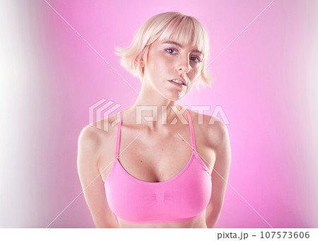 Young woman, portrait and fitness with gen z, fashion and exercise, trendy and beauty on pink background. Sports style with mockup space, wellness and female face, youth and dream with fog and active 107573606
