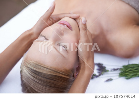 Spa facial, relax and massage, woman with natural health, wellness and luxury treatment for stress relief. Beauty salon, professional skin care therapist hands and face of girl in cosmetic therapy. 107574014