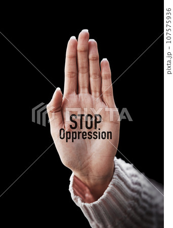 Open palm, text and closeup to stop oppression for human rights, art solidarity for equality by black background. Hand, overlay and support with motivation, justice or opinion for promotion of peace 107575936