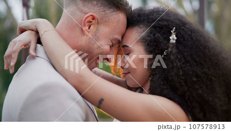 Wedding dance, couple closeup and hug in park gazebo outdoor with love, commitment and trust together. Garden, romance and ceremony with bride and groom with calm and care with embrace and smile Wedding dance, couple closeup and hug in park gazebo outdoor with love, commitment and trust together. Garden, romance and ceremony with bride and groom with calm and care with embrace and smile 107578913