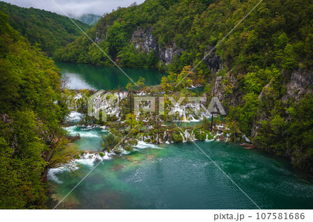 Lakes and waterfalls in the green forest, Plitvice lakes, Croatia Lakes and waterfalls in the green forest, Plitvice lakes, Croatia 107581686