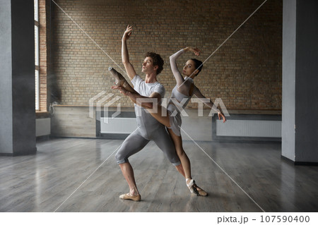 Graceful classic ballet duet, contemporary choreography dancers 107590400