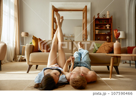 Joyful loving heterosexual couple having tender romantic moment Joyful loving heterosexual couple having tender romantic moment 107590466