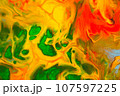 Abstract background from spilled paints. Multi-colored paints on canvas. 107597225
