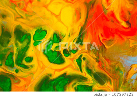 Abstract background from spilled paints. Multi-colored paints on canvas. Abstract background from spilled paints. Multi-colored paints on canvas. 107597225