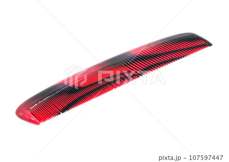 Hair comb isolated on white background with selective focus 107597447