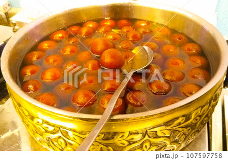A picture of gulab jamun with selective focus 107597758