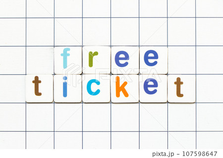 Colorful tile letter in word free ticket on white grid background 107598647