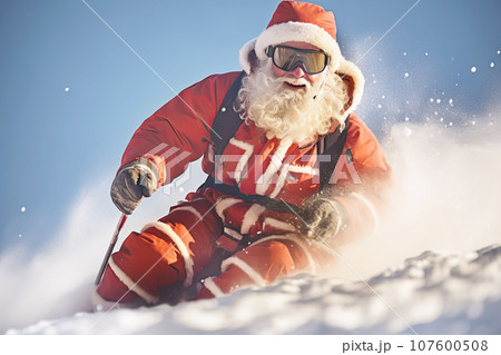 Santa Claus skier skiing downhill on a snowy slope at Christmas 107600508