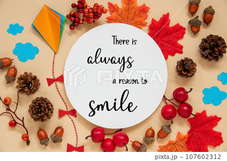 Fall Decoration, Autumn Leaves and Kite, With Text There Is Always A Reason To Smile 107602312