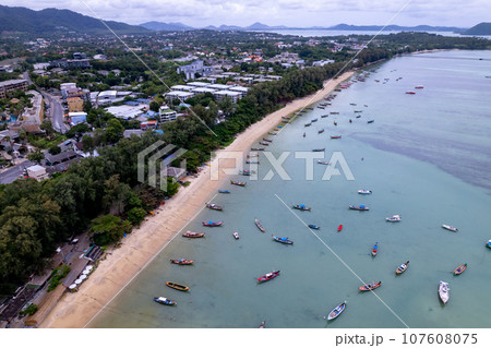 Aerial drone bird's eye view photo Top down of tropical sea with long tail fishing boats Travel boats at phuket thailand, Amazing top view sea nature landscape 107608075