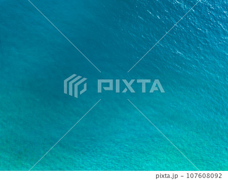 Sea water surface ocean background, Bird's eye view ocean in sunny day,Sea ocean waves water background,Top view sea seascape Sea water surface ocean background, Bird's eye view ocean in sunny day,Sea ocean waves water background,Top view sea seascape 107608092