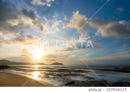 Landscape colorful clouds in the sky sunset or sunrise over sea with reflection in the tropical sea,Beautiful landscape scenery,Amazing light of nature, Landscape nature background 107608123