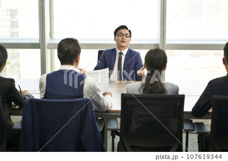 over confident young asian business person talking big in front of hr interviewers during job interview over confident young asian business person talking big in front of hr interviewers during job interview 107619344