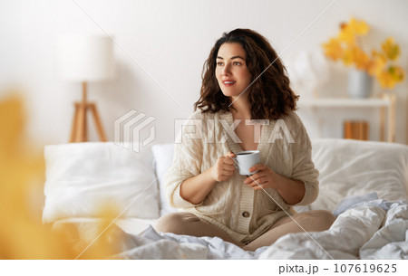 woman enjoying sunny morning 107619625