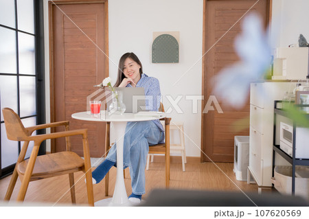 asian woman freelancer relax and happy during working from home asian woman freelancer relax and happy during working from home 107620569