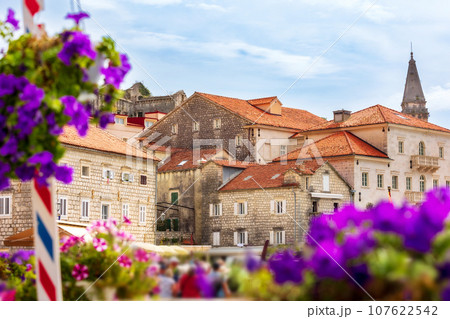 Houses of Perast, Montenegro and flowers Houses of Perast, Montenegro and flowers 107622542