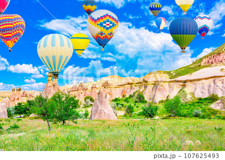 Fly of air balloons in Unique natural place - Cappadocia , Turkiye. Fly of air balloons in Unique natural place - Cappadocia , Turkiye. 107625493