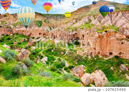 Fly of air balloons in Unique natural place - Cappadocia , Turkiye. 107625499