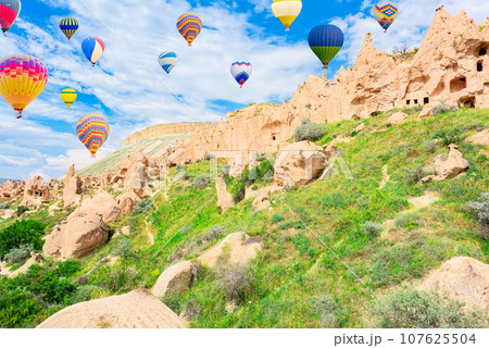 Fly of air balloons in Unique natural place - Cappadocia , Turkiye. 107625504