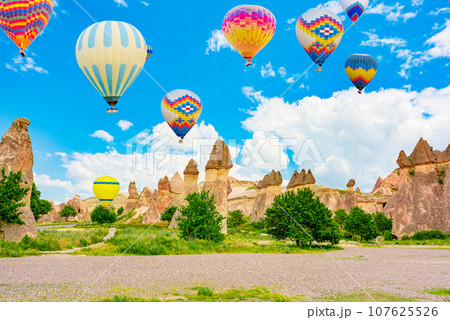 Fly of air balloons in Unique natural place - Cappadocia , Turkiye. Fly of air balloons in Unique natural place - Cappadocia , Turkiye. 107625526
