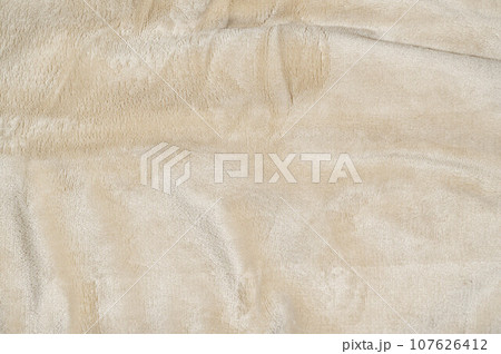 光沢のあるベージュ色の毛布 光沢のあるベージュ色の毛布 107626412