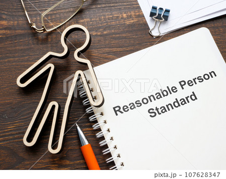 Figurine and document about Reasonable person standard. Figurine and document about Reasonable person standard. 107628347