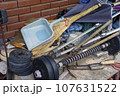 A warehouse piled with clutter such as cleaning tools and dumbbells 107631522