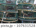 A sea port town piled with fishing nets, fishery-related tools 107631528