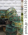 A sea port town piled with fishing nets, fishery-related tools 107631530