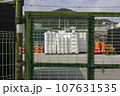 Fishing tools and props seen through the port city scenery and steel doors 107631535