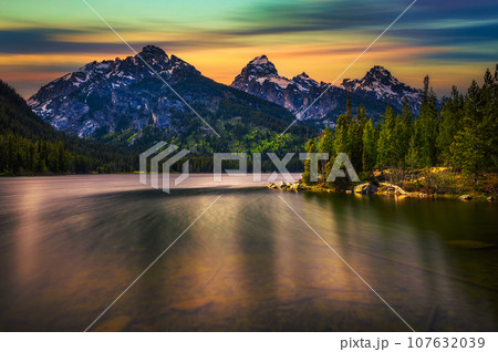 Sunset over Taggart Lake and Grand Teton Mountains in Wyoming, USA 107632039
