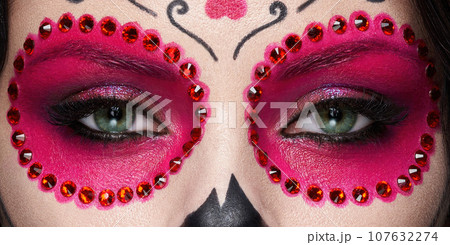 Beautiful female eyes with makeup sugar skull 107632274
