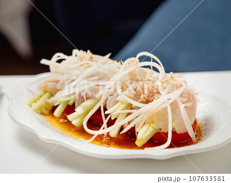 Sophisticated Fish ceviche in modern restaurant interior. Ceviche or Cebiche is a fish dish of the cuisine of Peru 107633581