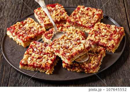 Berry Bars with Rolled Oat and Nut Topping Berry Bars with Rolled Oat and Nut Topping 107645552
