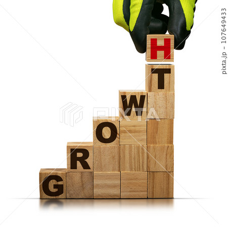 Gloved Hand Arranging Wooden Blocks with Text Growth Isolated on White Gloved Hand Arranging Wooden Blocks with Text Growth Isolated on White 107649433