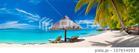tropical island with palm trees, a pristine sandy beach, crystal-clear turquoise waters, and a couple lounging under a thatched beach umbrella. 107654093