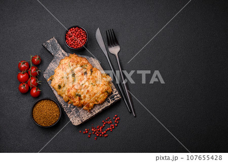 Delicious fried chicken chop or pork meat fried breaded with salt, spices and herbs Delicious fried chicken chop or pork meat fried breaded with salt, spices and herbs 107655428