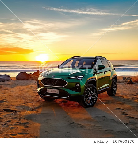 an electric suv parked on the beach in front of the ocean at sunset, with the sun shining through the clouds 107660270
